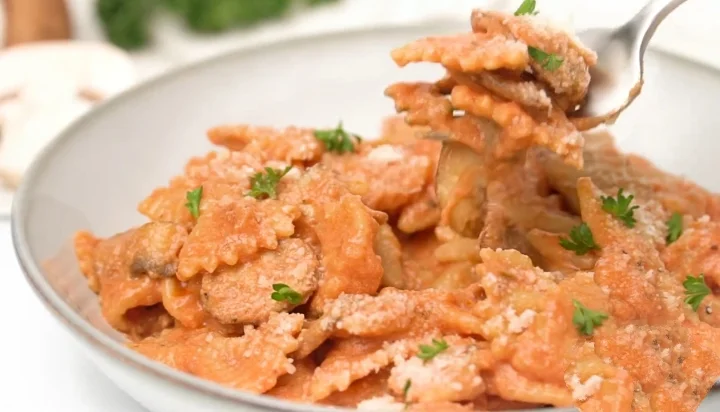 Enjoy Farfalle pasta with mushroom rose sauce