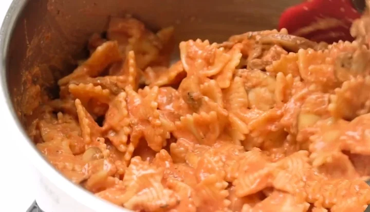 Enjoy Farfalle pasta with mushroom rose sauce